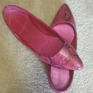 Hot pink flat shoes.