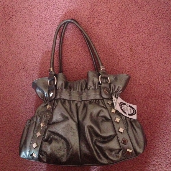 Brand new never used "Kathy van Zeeland" bag