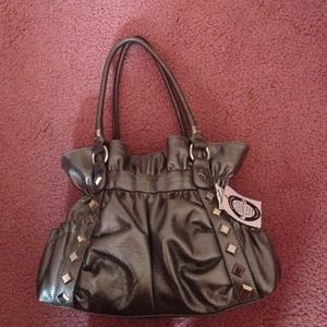 Brand new never used "Kathy van Zeeland" bag