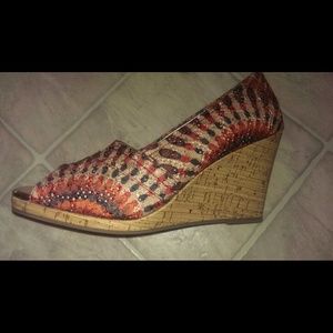 Gold , red, and Brown wedges . **Never been worn**