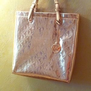 michael kors metallic rose gold handbag