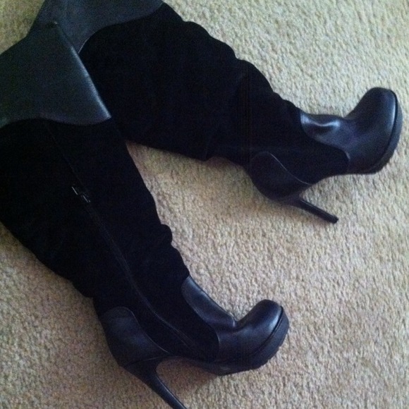 Reduced from $55. Black suede and leather boots