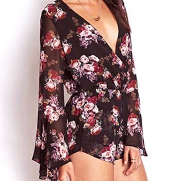 Long bell sleeved floral romper! (Never worn)