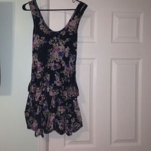 A navy blue floral ruffled dress.