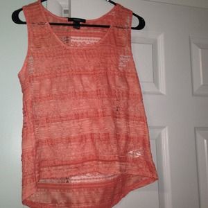 A orange/dark peach "lace" baggy tank-top.
