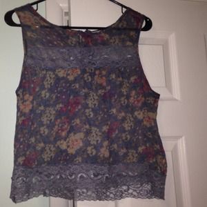 A sheer floral lace crop top