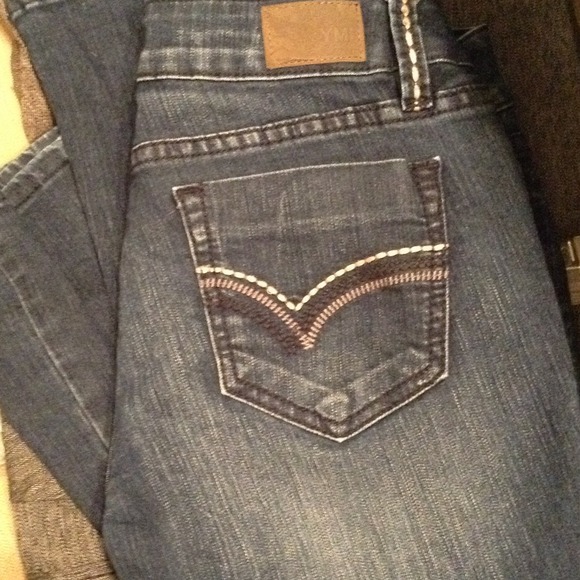 Dark wash fashion jeans.