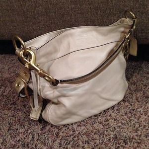 Cream and metallic gold Coach purse
