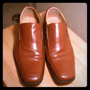 A pair of Cognac loafers and Nike Waffles bundle