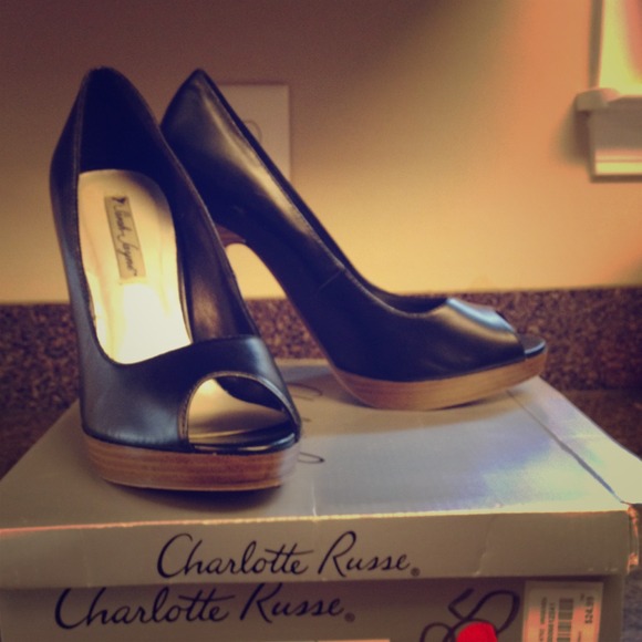 Black heels with tab base worn twice