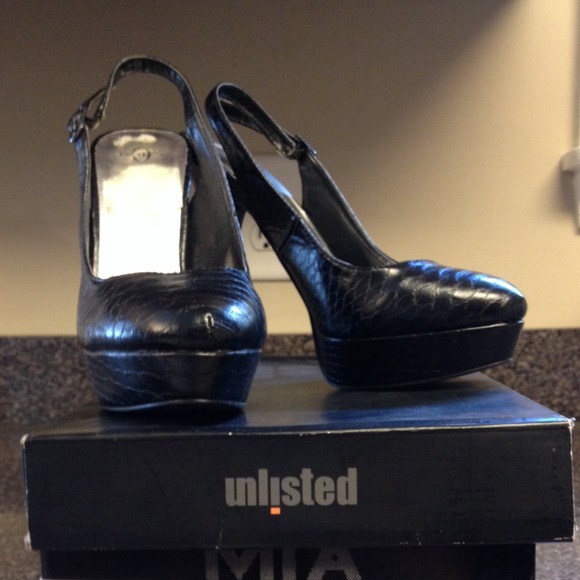 Black snakeskin sling back heels