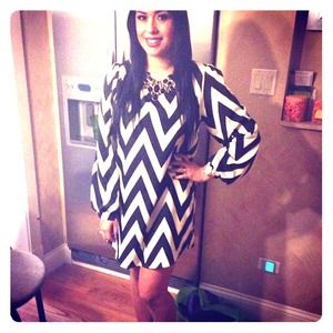 Zag along black and ivory stripped dress.