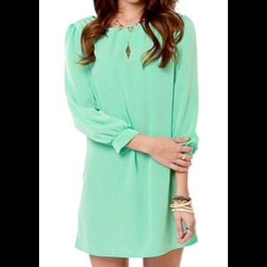Mint green shift dress.