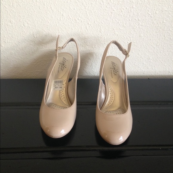 Nude closed toe, open heel wedge.
