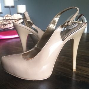 Nude color closed toe sling back heel