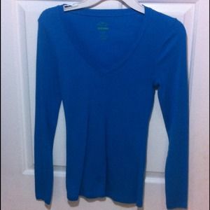 Long sleeved blue shirt