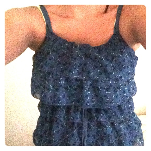 A frilly layerd shirt. Blue with floral.