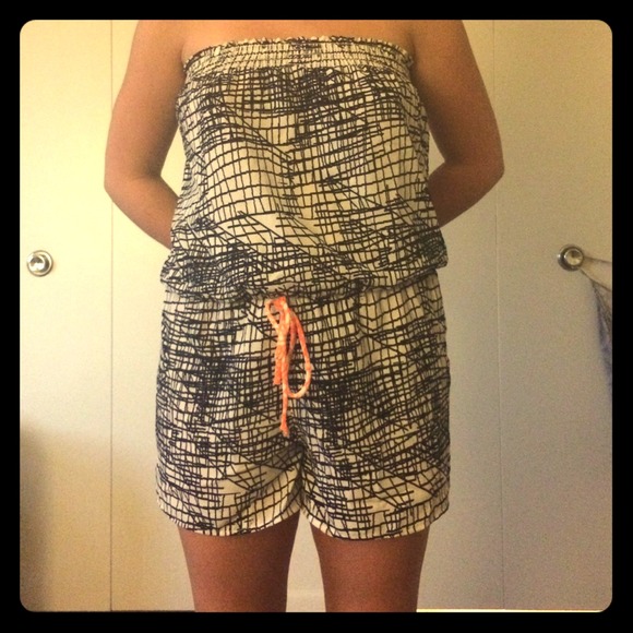 Romper with orange bow string and navy blue lines