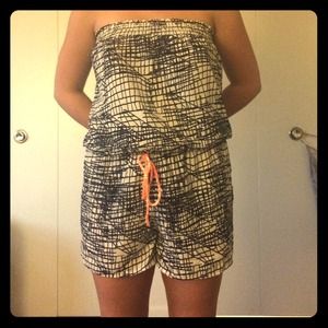Romper with orange bow string and navy blue lines