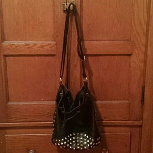 Gold studded handbag