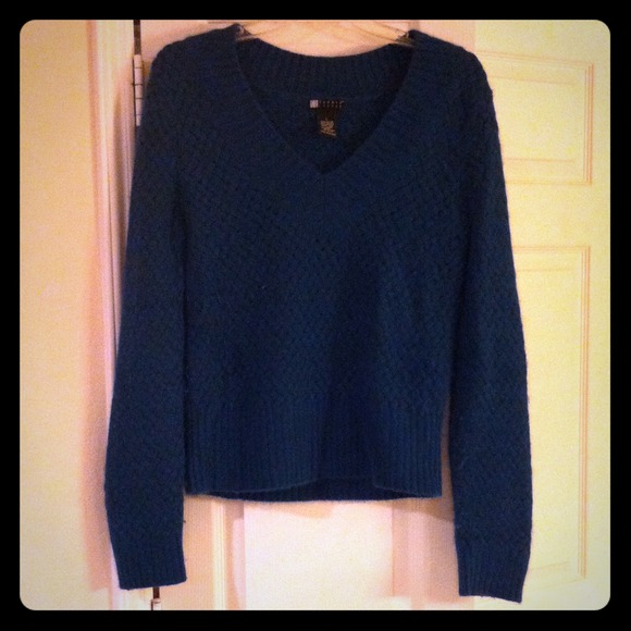 Carole Little Turquoise Sweater with chic design!