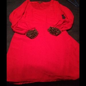 Beautiful with beaded wrist. Fits like a 14/16