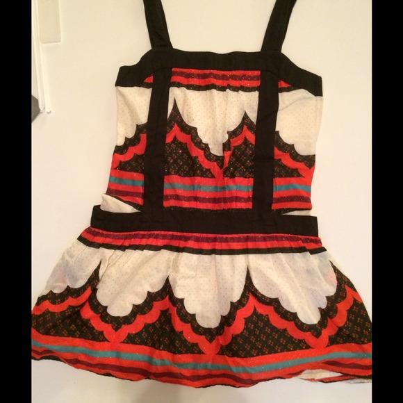 Orange/ White pattern skirt.