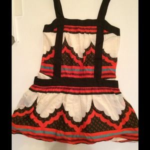 Orange/ White pattern skirt.