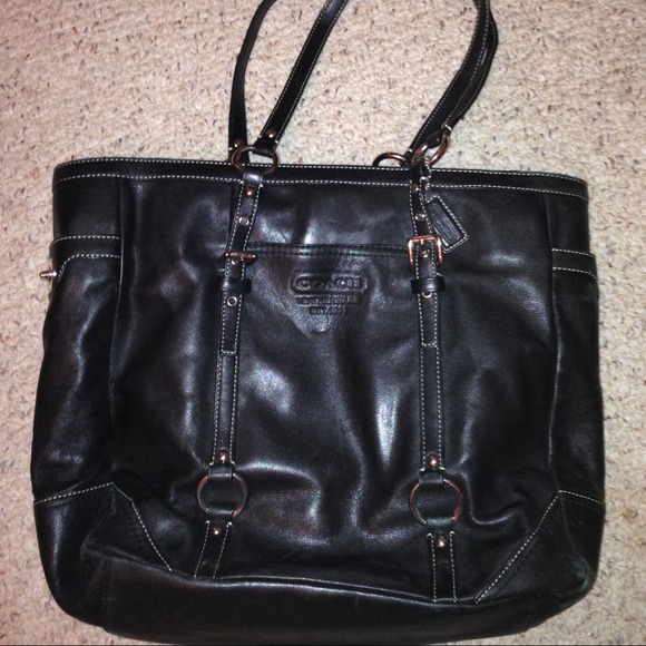 Large Leather Coach book bag.