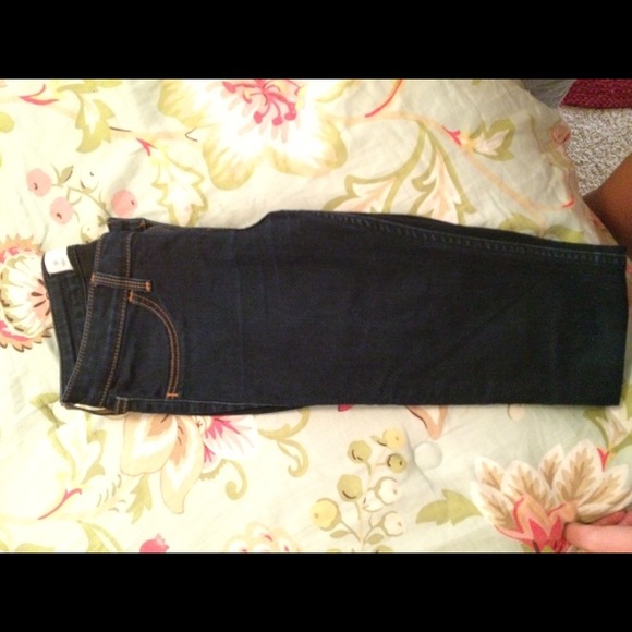 Hollister dark jeans.