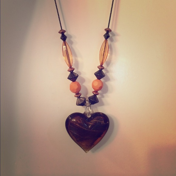 Brown beaded heart necklace.