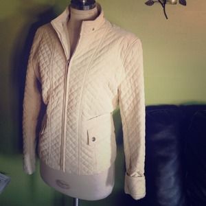 Cream colored quilted jacket with detachable hood