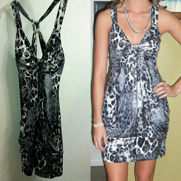 Cute dress but no longer have use for it.