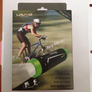 Water resistant FM radio, MP3, and LED flashlight