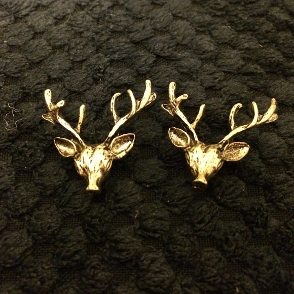 Gold deer earrings.