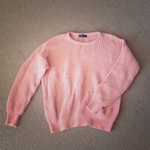 A barely worn pink fisherman sweater