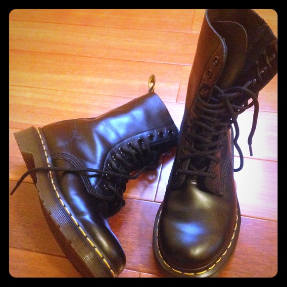 *item held* Black leather Dr. Martens 1490s.