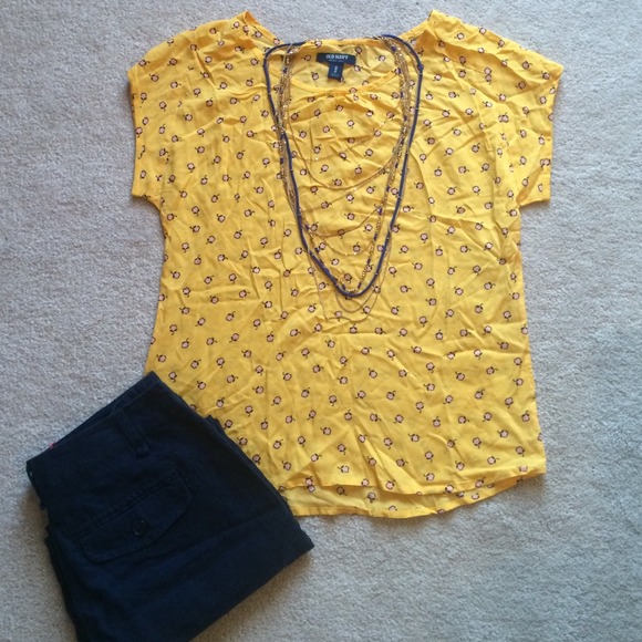 Yellow shirt with pink & blue flowers