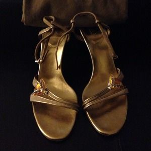 Gold Gucci heels