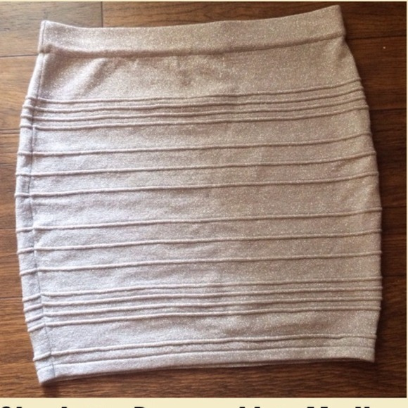 Shimmery silver body con skirt