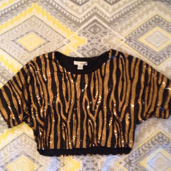 Get wild! 80's style glam animal print sequins top