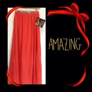 Iman Chiffon overlay skirt. Lowered Firm