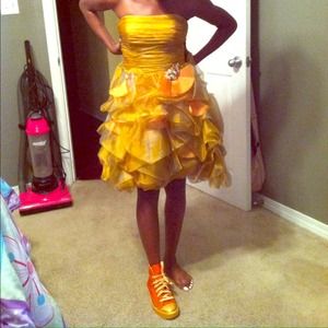 A short gown/homecoming/prom dress