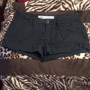 Polka dot shorts.