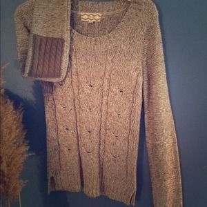 Tan sweater with patched elbows