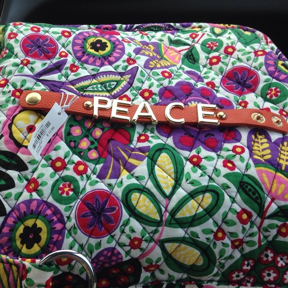 Orange leather Peace snap closure bracelet