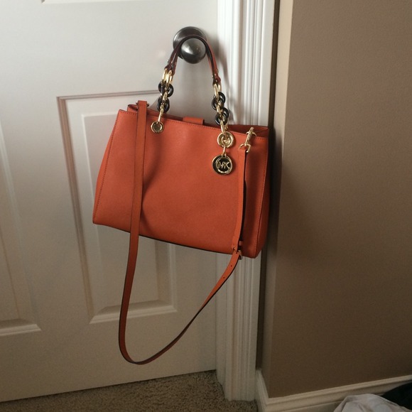 Like new tangerine Cynthia MK bag