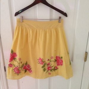 Yellow skirt with hand sewn flowers