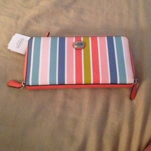 Multi colored coach wallet.