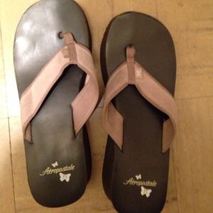Brown and ran Aeropostale flip flops size 8.5